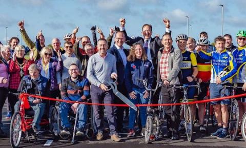 Jesse Norman MP, Chris Boardman MBE and local cyclists at the opening of the Hereford cycle track