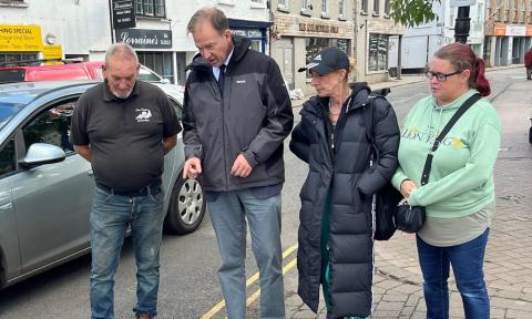 Jesse Norman MP inspecting flood damage with Leon Davies and Cllrs Milly Boylan and Katie Fowler 